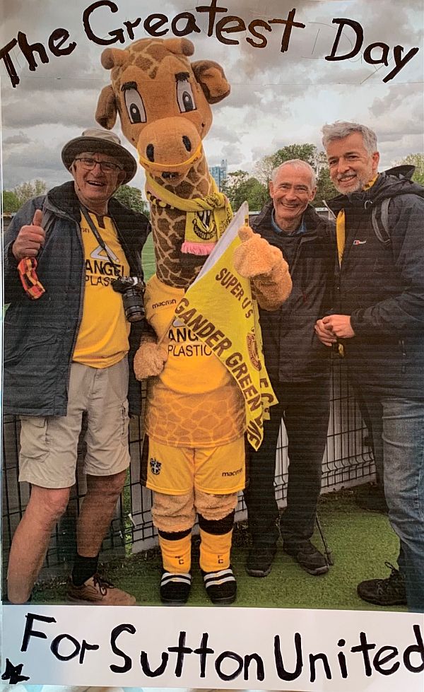 The Greatest Day for Sutton United: Bobby, Jenny (mascot, a giraffe), David, Andrew.