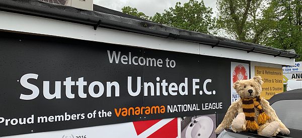 Bertie outside the entrance to Sutton United.