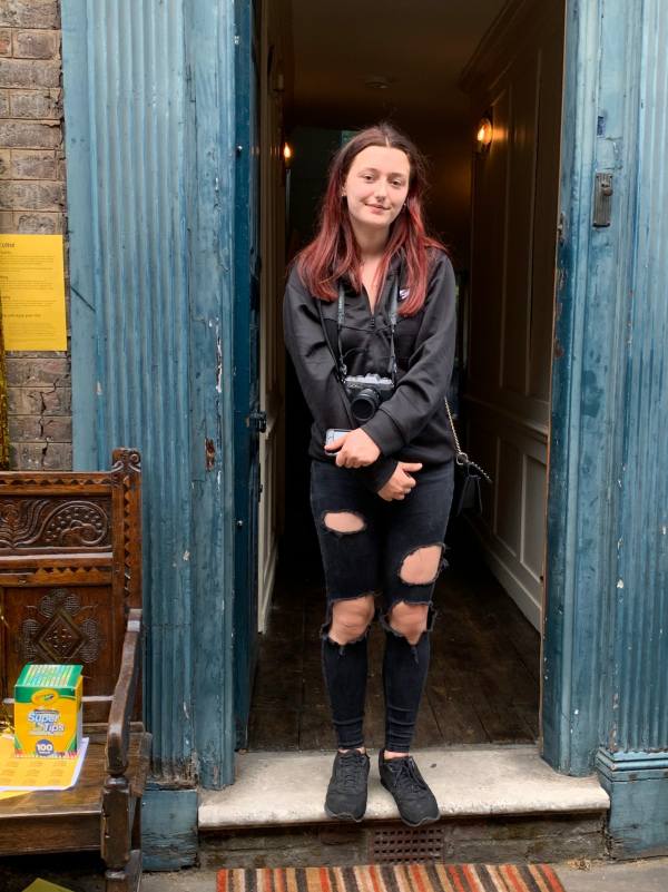 Amber in the doorway of 31 Fournier Street.