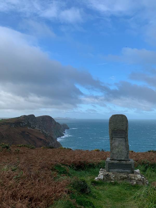 Memorial to Dewi Emrys and looking out to the sea.