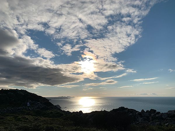 Sun reflecting on the sea from the top of Garn Fawr.