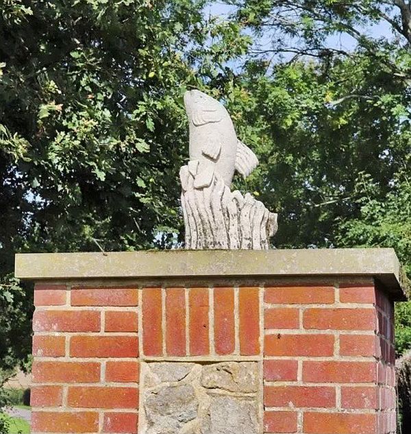 Steon trout on one of the gateposts to Trout Grange.