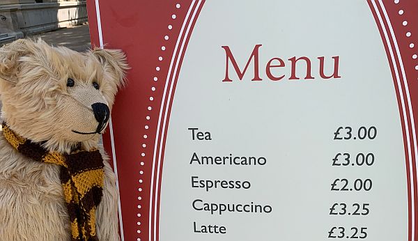 Bertie by the menu. Tea £3.00.