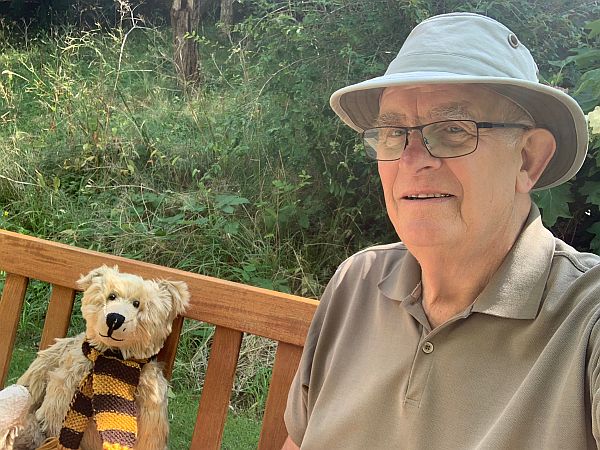 Bertie and Bobby sat on a bench.