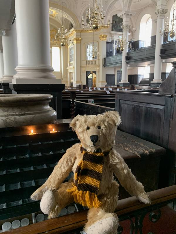 Bertie in St Martin-in-the-Field with candles lit for Diddley and Peter.