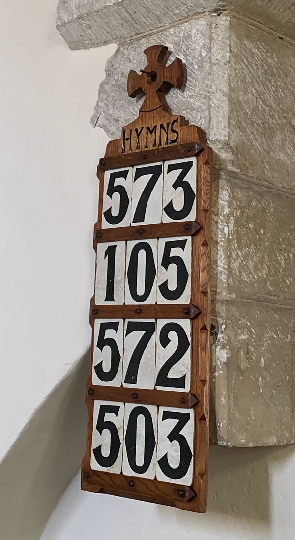 The hymn board.