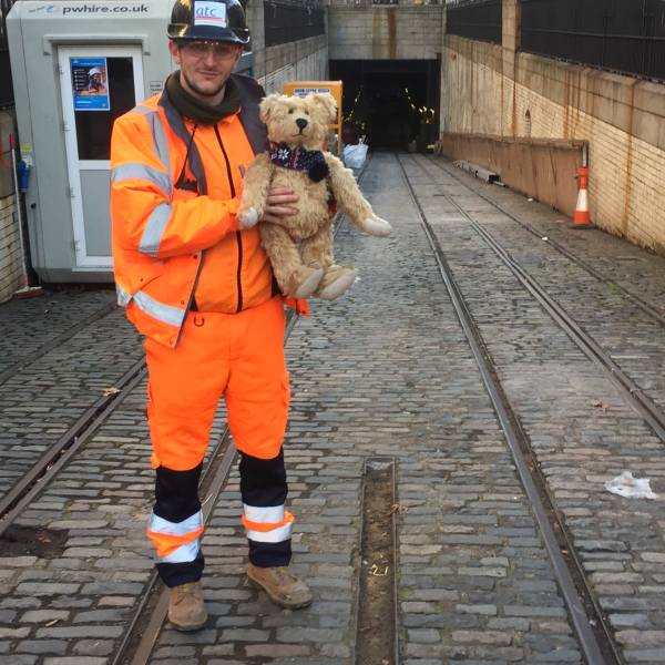 Bertie posing with a Crossrail worker at the entrance to the Kingsway Tram Tunnel.