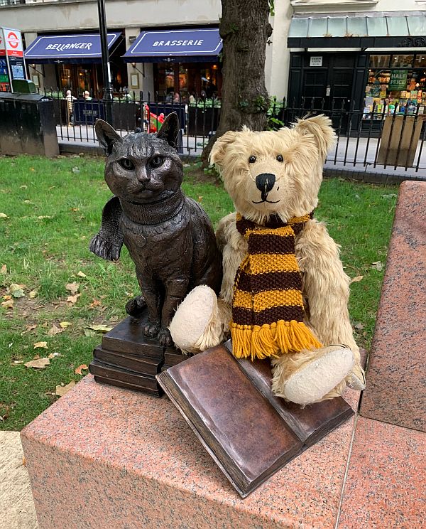 Bertie sat alongside the statue of Bob.