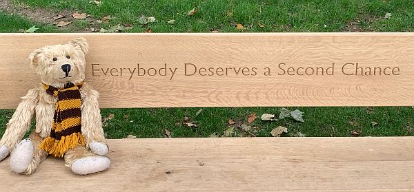 Bertie dat on the bench with the inscription "Everybody Deserves a Second Chance".