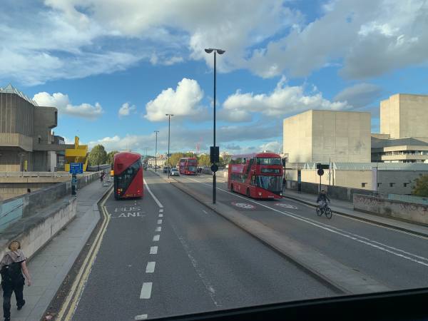 View of three "Borismaster" buses on Waterloo Bridge.