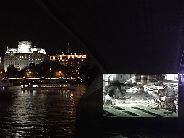 Ladies Bridge piers used as a cinema screen.