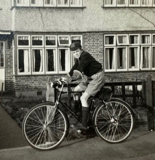 Bobby on his Triumph Sports Bicycle outside 138 Brocks Drive.