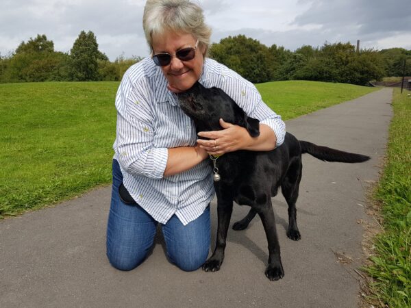 Oakley greeting Tracey when coming back to visit during retirement.