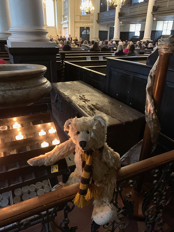 Bertie with a candle lit for Diddley in St Martin in the Fields.