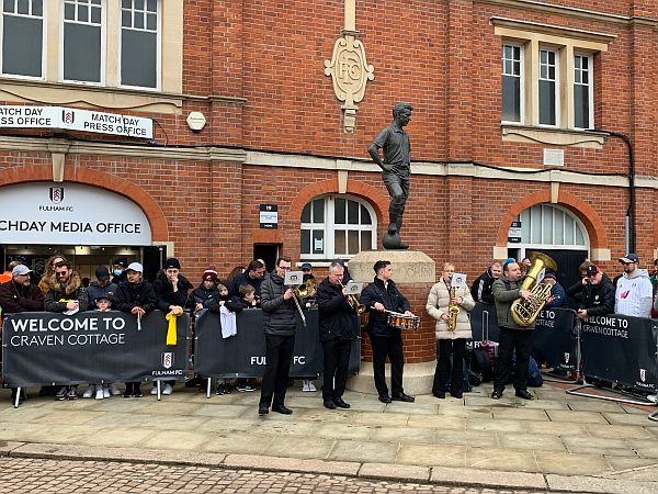 Match day band outside Craven Cottage.