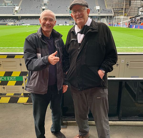 David and Bobby inside the ground.