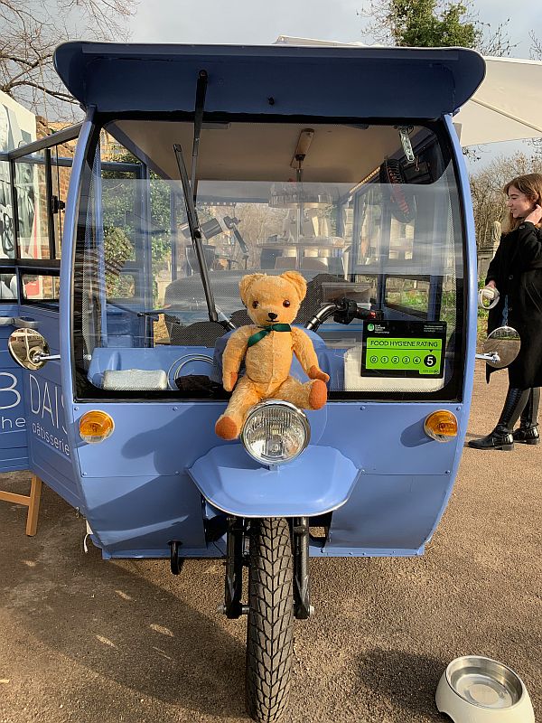 Eamonn sat on the front of the motor tricycle.