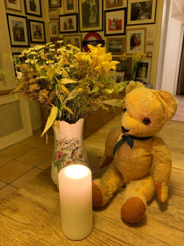 Eamonn, with some flowers and a candle lit for Diddley.