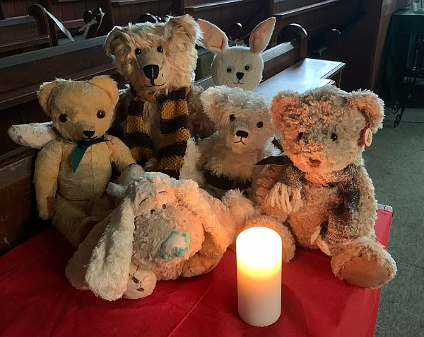 Bertie, Eamonn and Trevor together with church furry friends.