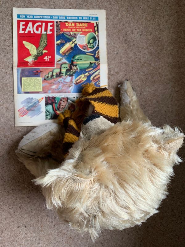 Bertie reading a copy of The Eagle.