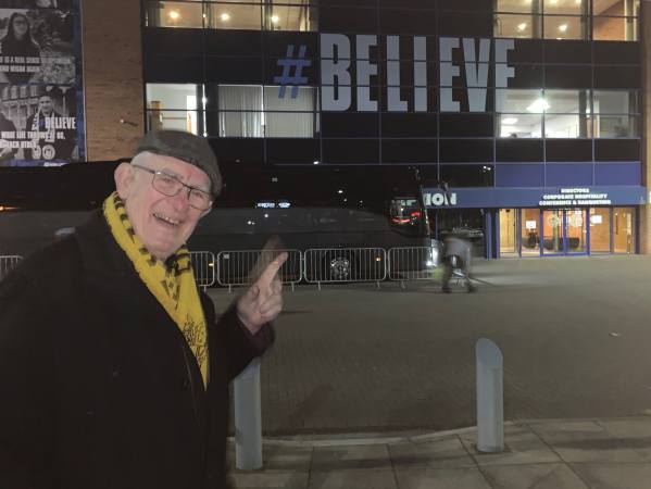 Bobby outside Wigan Athletic Football Club.