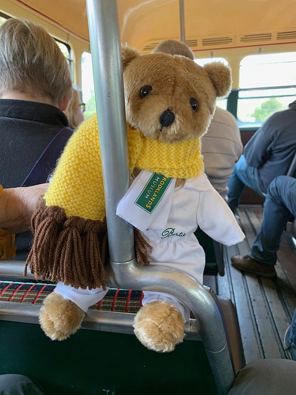 Brooklands Bertie on a seat upstairs in an old London bus.