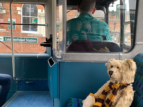 Bertie sat on the longitudinal seat behind the driver with the bus facing Letherhead station.