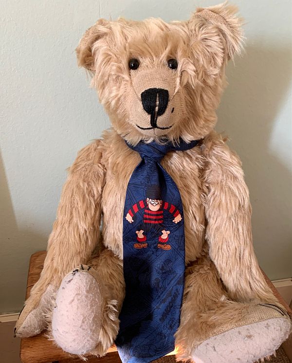 Bertie wearing a Dennis the Menace tie.