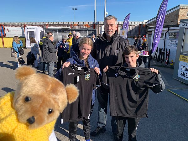 Andrew, Daisy, Herbie and Brooklands Bertie with their Sutton United shirts.