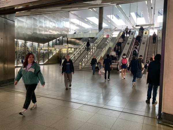 Escalators to the exit at Farringdon Station.