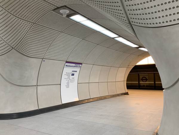 Passenger walkway tunnel to the Westbound platform of the Elizabeth Line at Tottenham Court Road.