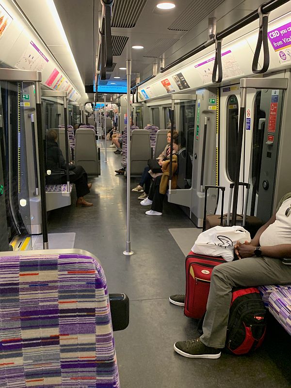 Interior of a lightly loaded Elizabeth Line train.