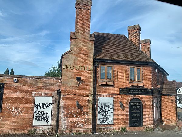 The closed and graffitti strewn HG Wells pub, Worcester Park.