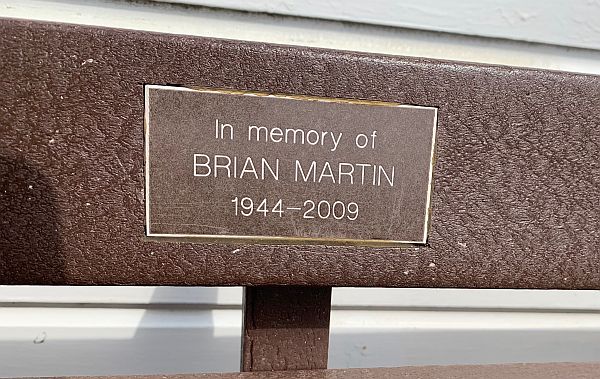 A plaque on the bench remembering a Brian Martin, 1944-2009.