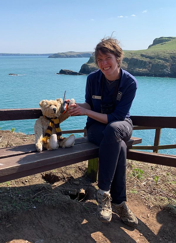 Bertie and Ceris sitting on a bench on Skomer.