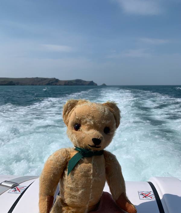 Eamonn on the boat speeding away from the islands.