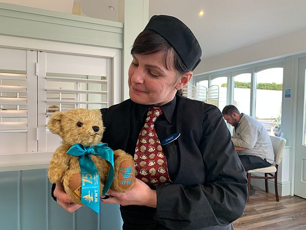 Tundi holding Bewick Bear.