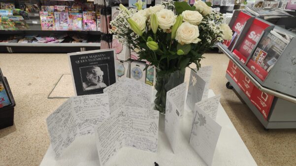 Floral tributes and messages of condolence in Morrison's, Brentford.