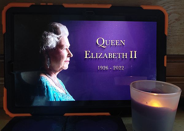 A candle lit for Her Majesty the Queen, Diddley and Bobby.