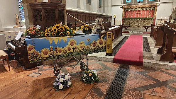 Bertie on the Sunflower coffin.