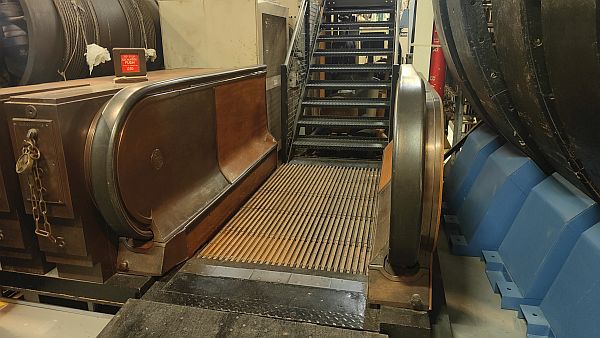 Section of wooden escalator.